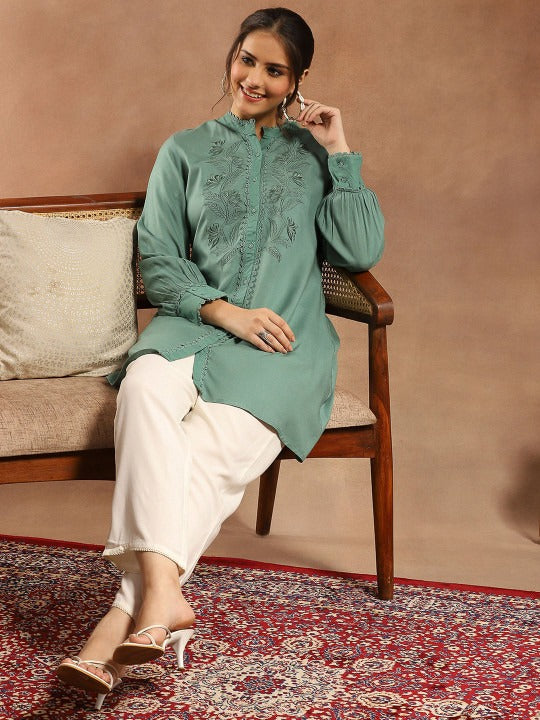 Women Solid Embroidered A-line Viscose Rayon Tunic