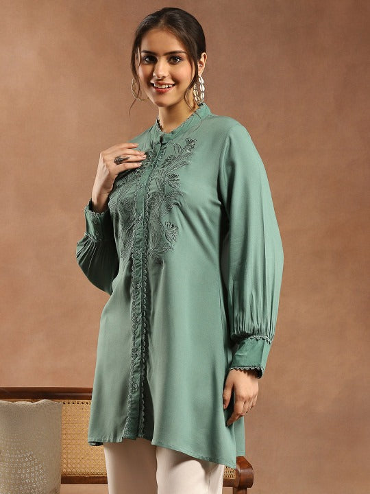Women Solid Embroidered A-line Viscose Rayon Tunic